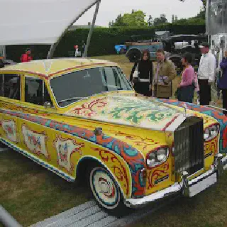 /img/46301-john-lennon-rolls-royce-caring.webp