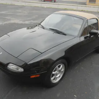 /img/46408-1994-miata-diecast-value.webp